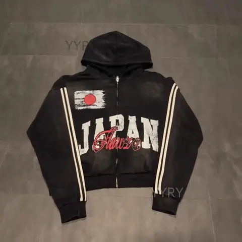 Catalog photo: Black zip hoodie with a JAPAN print and striped sleeves
